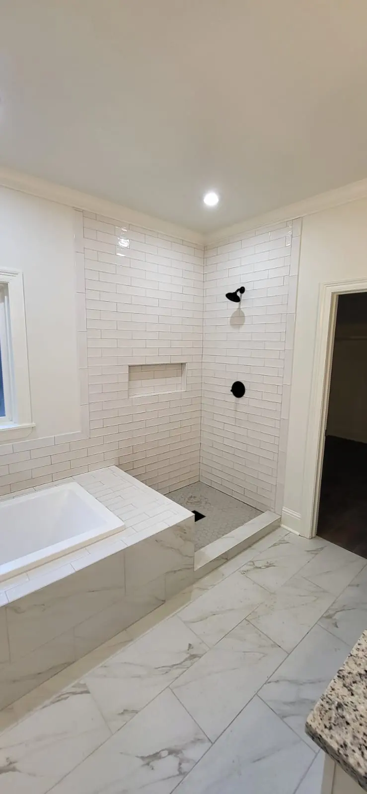 Subway tile shower installation in a bathroom remodel in Hattiesburg, MS